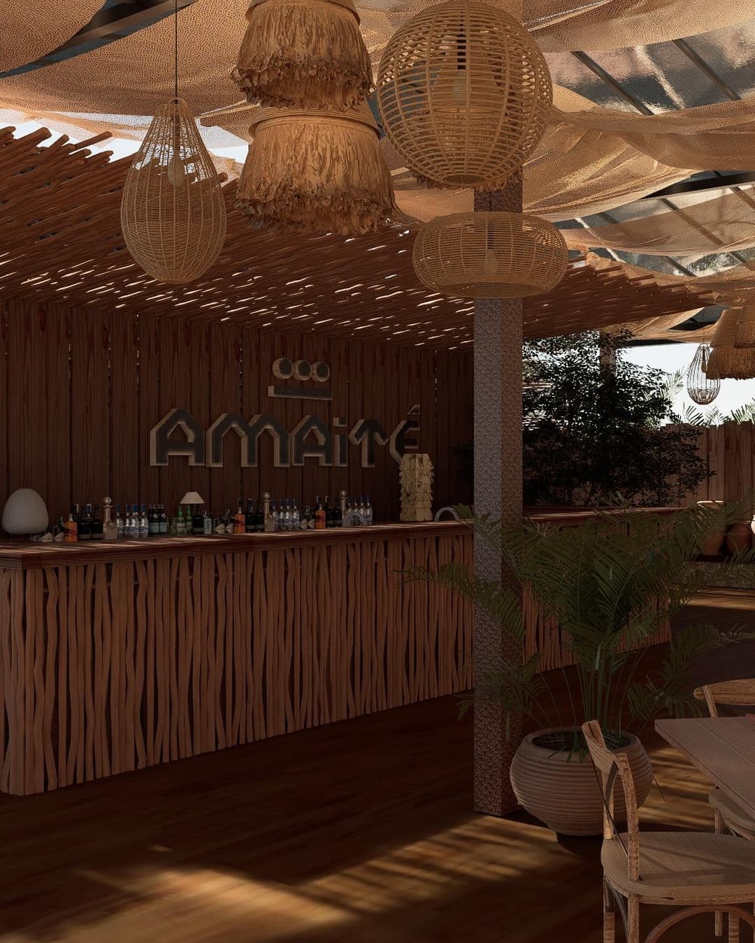 Bar do Amaité em madeira e palha, sob luminárias de fibra natural